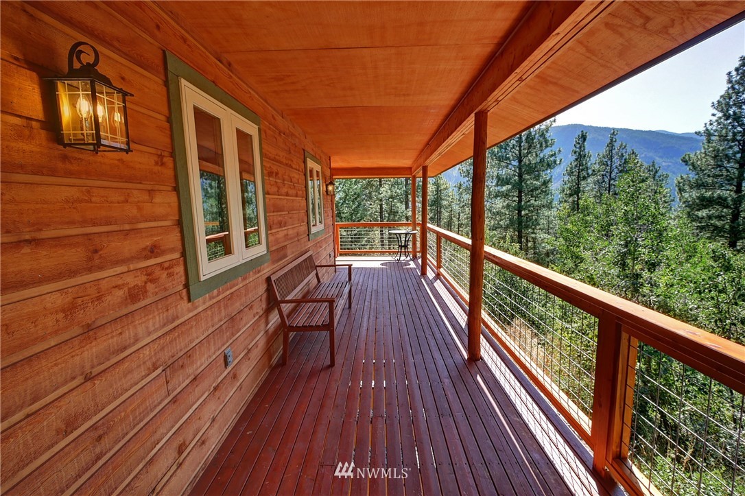 41 Trillium Road Winthrop, WA 98862 - Photo 26 of 39 a view of balcony with wooden floor and fence