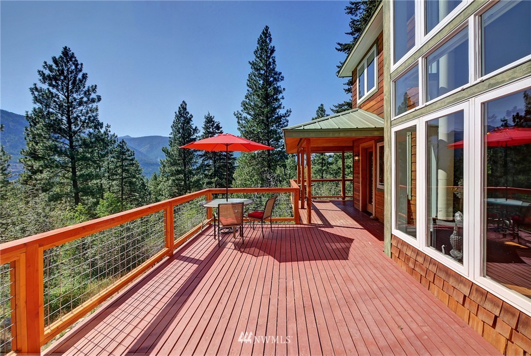 41 Trillium Road Winthrop, WA 98862 - Photo 4 of 39 a view of balcony with wooden floor and outdoor seating