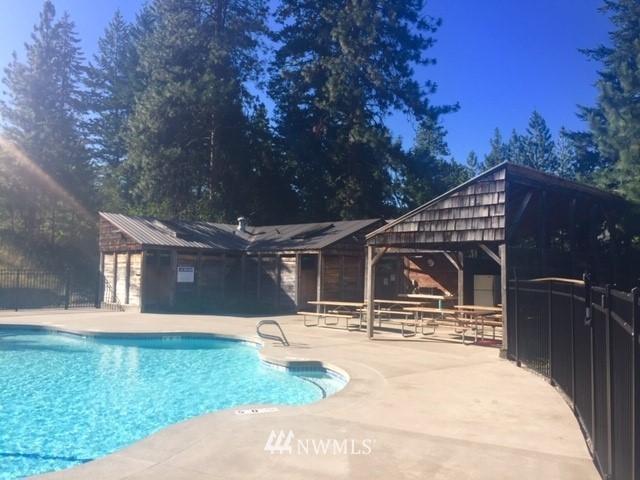 41 Trillium Road Winthrop, WA 98862 - Photo 33 of 39 front view of house with a yard