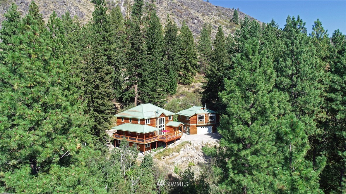 41 Trillium Road Winthrop, WA 98862 - Photo 8 of 39 an aerial view of a house with swimming pool and trees