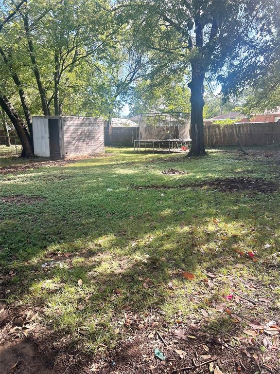 1016 North Howeth Street Gainesville, TX 76240 - Photo 15 of 15 a big yard with large trees