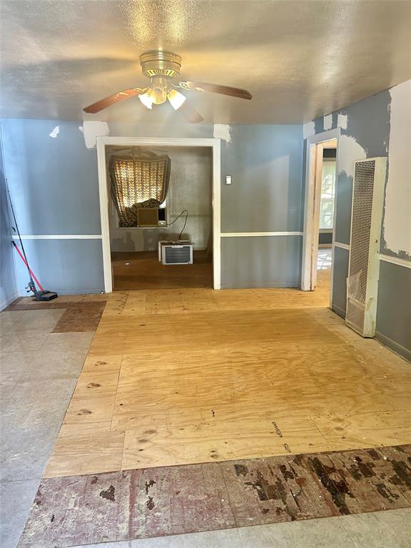 1016 North Howeth Street Gainesville, TX 76240 - Photo 2 of 15 a view of livingroom and kitchen with sink