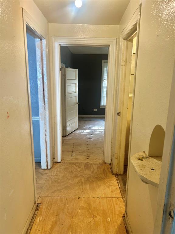 1016 North Howeth Street Gainesville, TX 76240 - Photo 10 of 15 a view of a bathroom with utility room