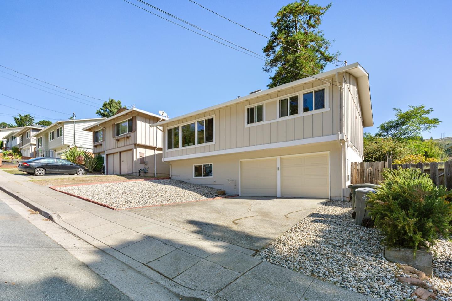 1528 Terra Nova Boulevard Pacifica, CA 94044 - Photo 2 of 32 a front view of a house with a yard