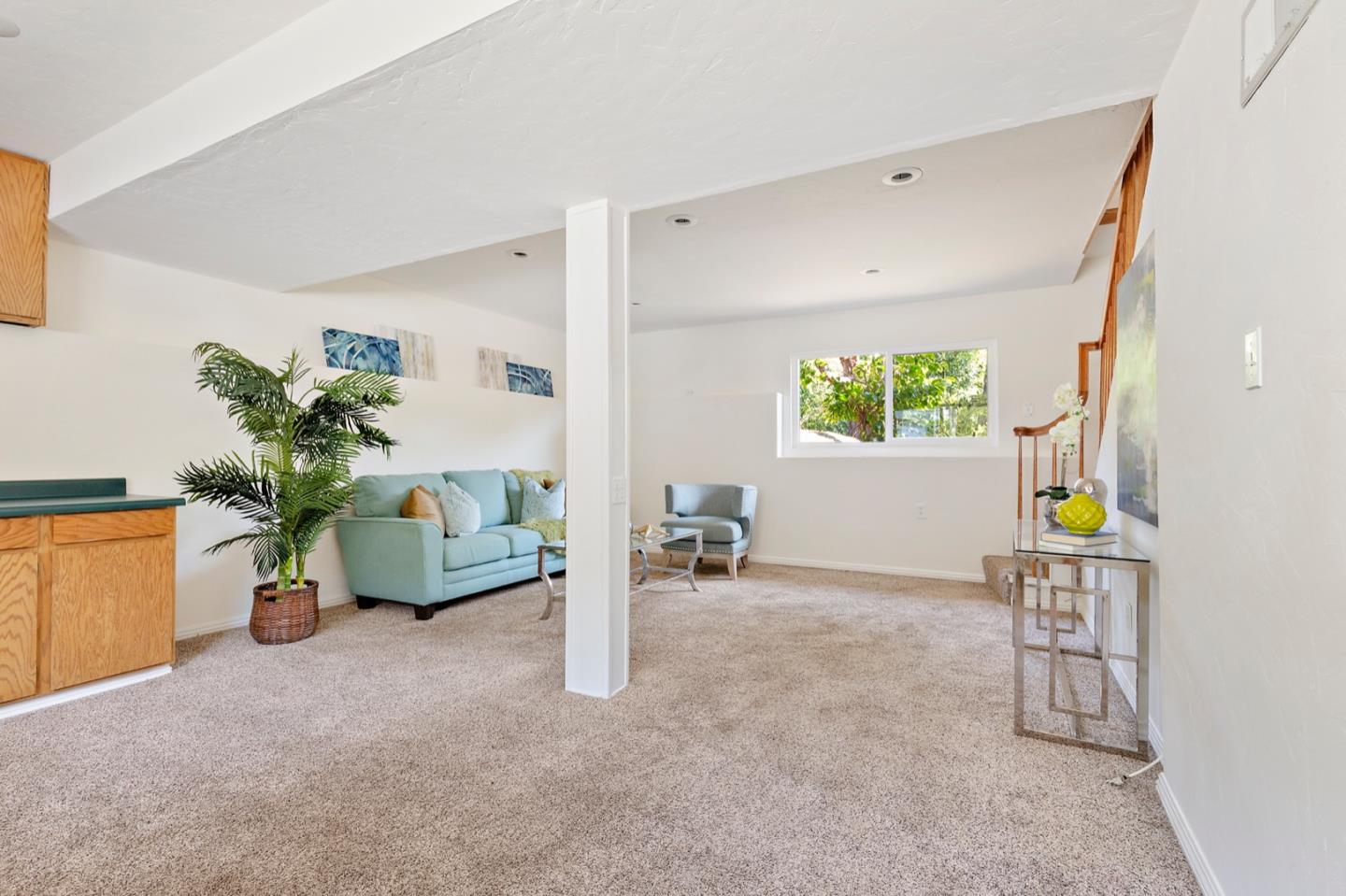 1528 Terra Nova Boulevard Pacifica, CA 94044 - Photo 27 of 32 a living room with furniture and a potted plant