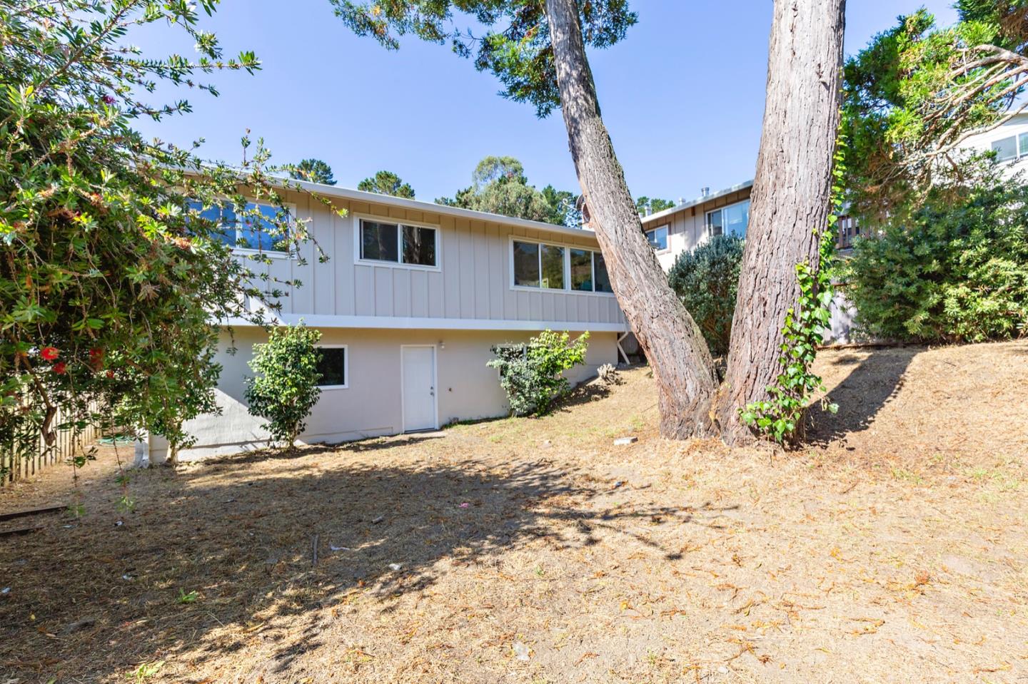 1528 Terra Nova Boulevard Pacifica, CA 94044 - Photo 30 of 32 a view of a house with a tree in the background