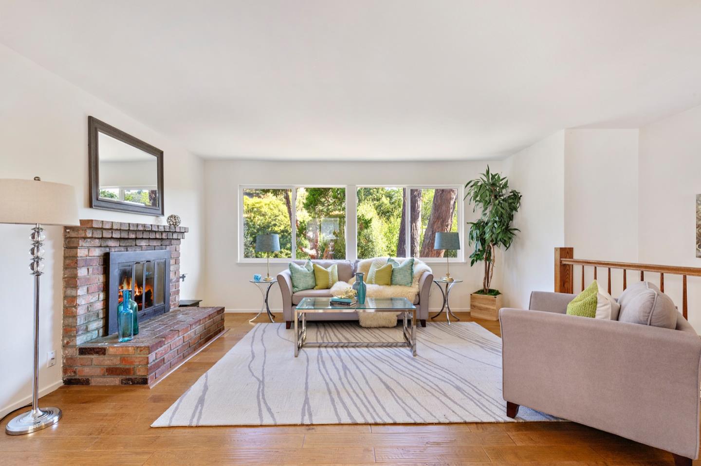 1528 Terra Nova Boulevard Pacifica, CA 94044 - Photo 5 of 32 a living room with furniture and a fireplace