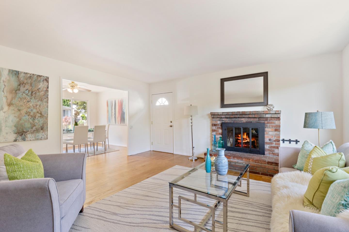 1528 Terra Nova Boulevard Pacifica, CA 94044 - Photo 7 of 32 a living room with furniture and a fireplace