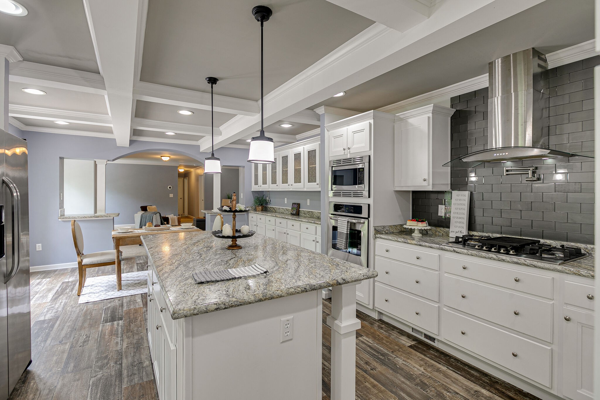 149 Saw Mill Road Dickson, TN 37055 - Photo 14 of 32 a kitchen with stainless steel appliances granite countertop a sink and cabinets