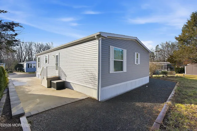 a front view of a house with swimming pool