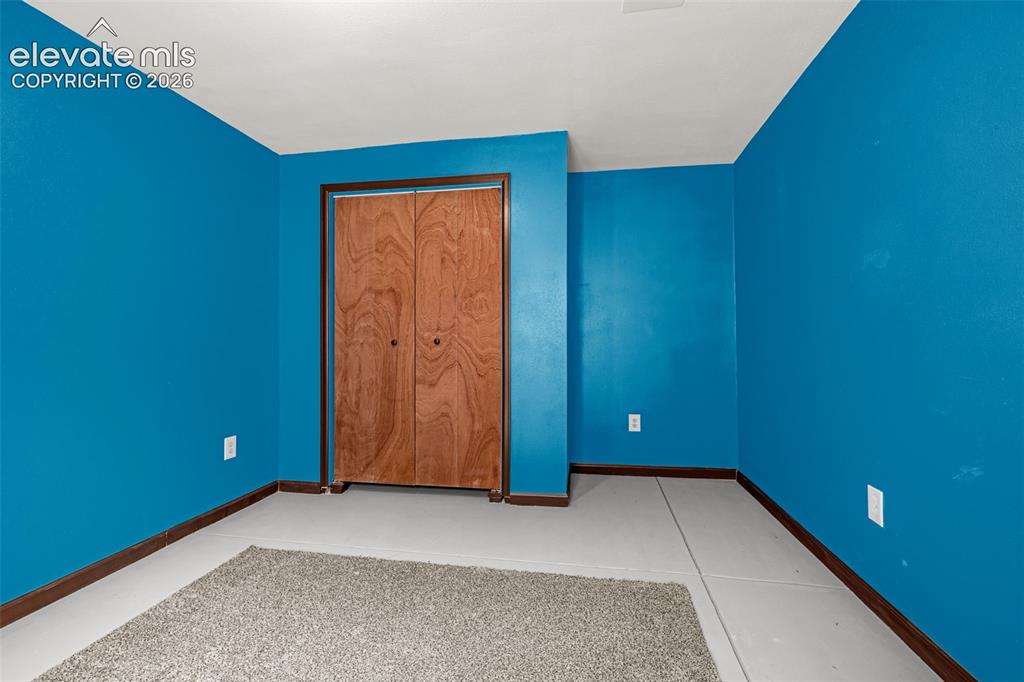 613 Wheat Field Road Fountain, CO 80817 - Photo 16 of 32 a view of an empty room