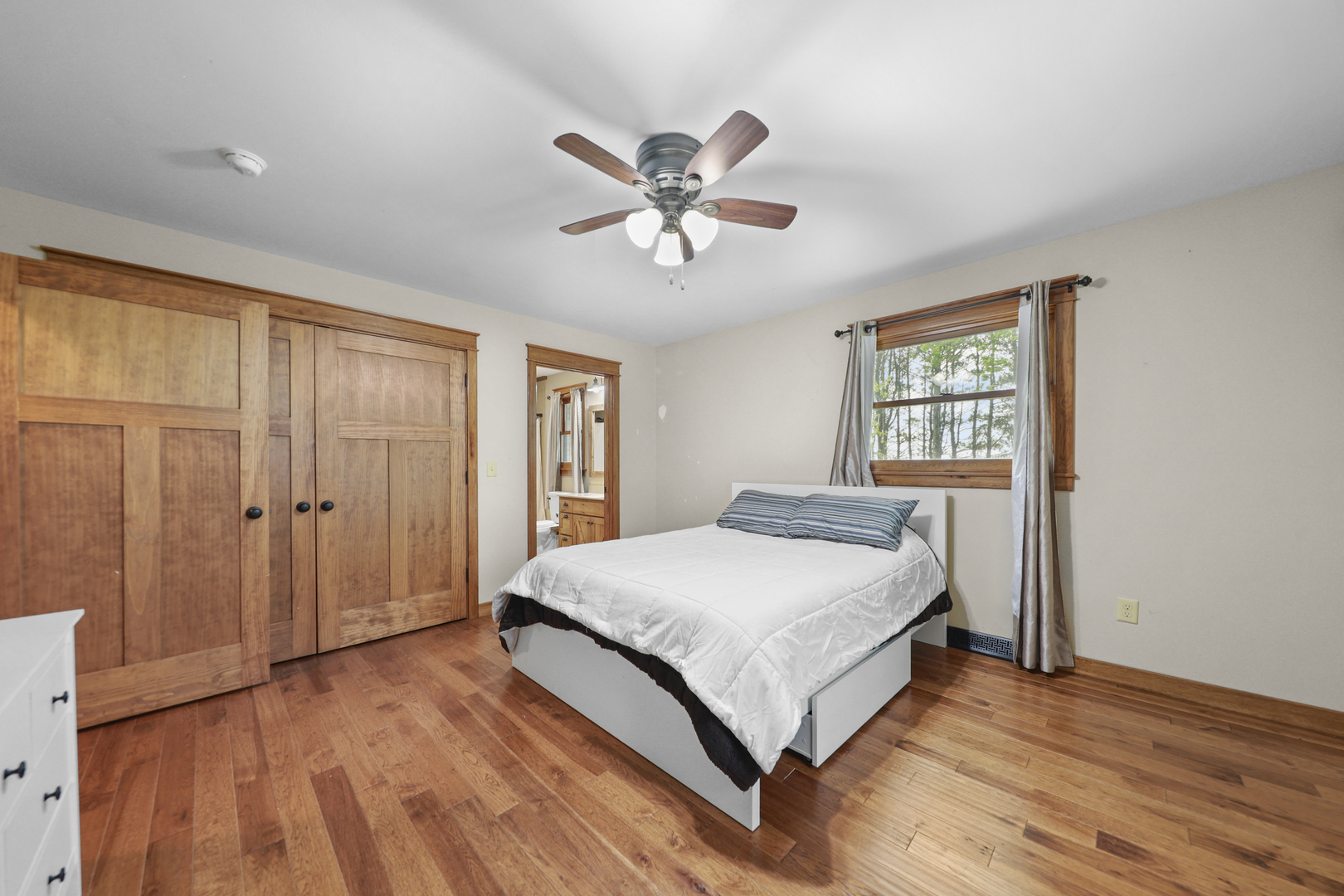 15547 Tower Road Lee, IL 60530 - Photo 15 of 24 a bedroom with a bed and a window