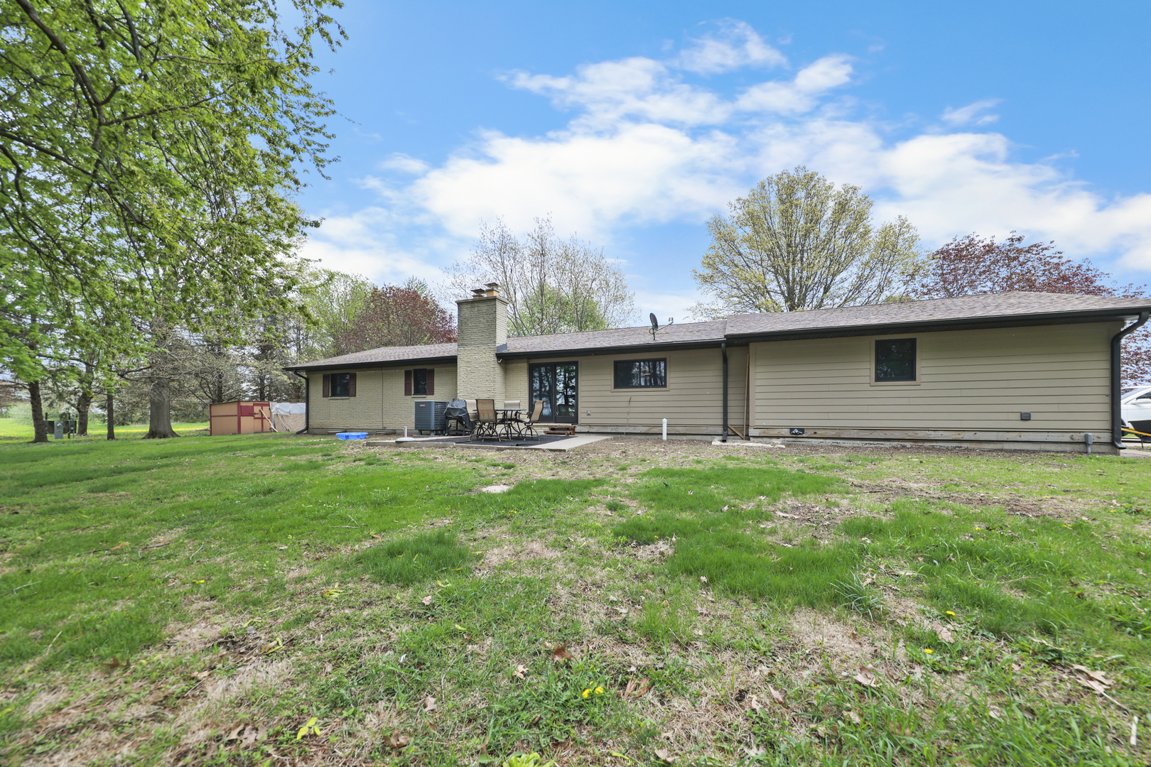 15547 Tower Road Lee, IL 60530 - Photo 20 of 24 a front view of house with yard and seating area