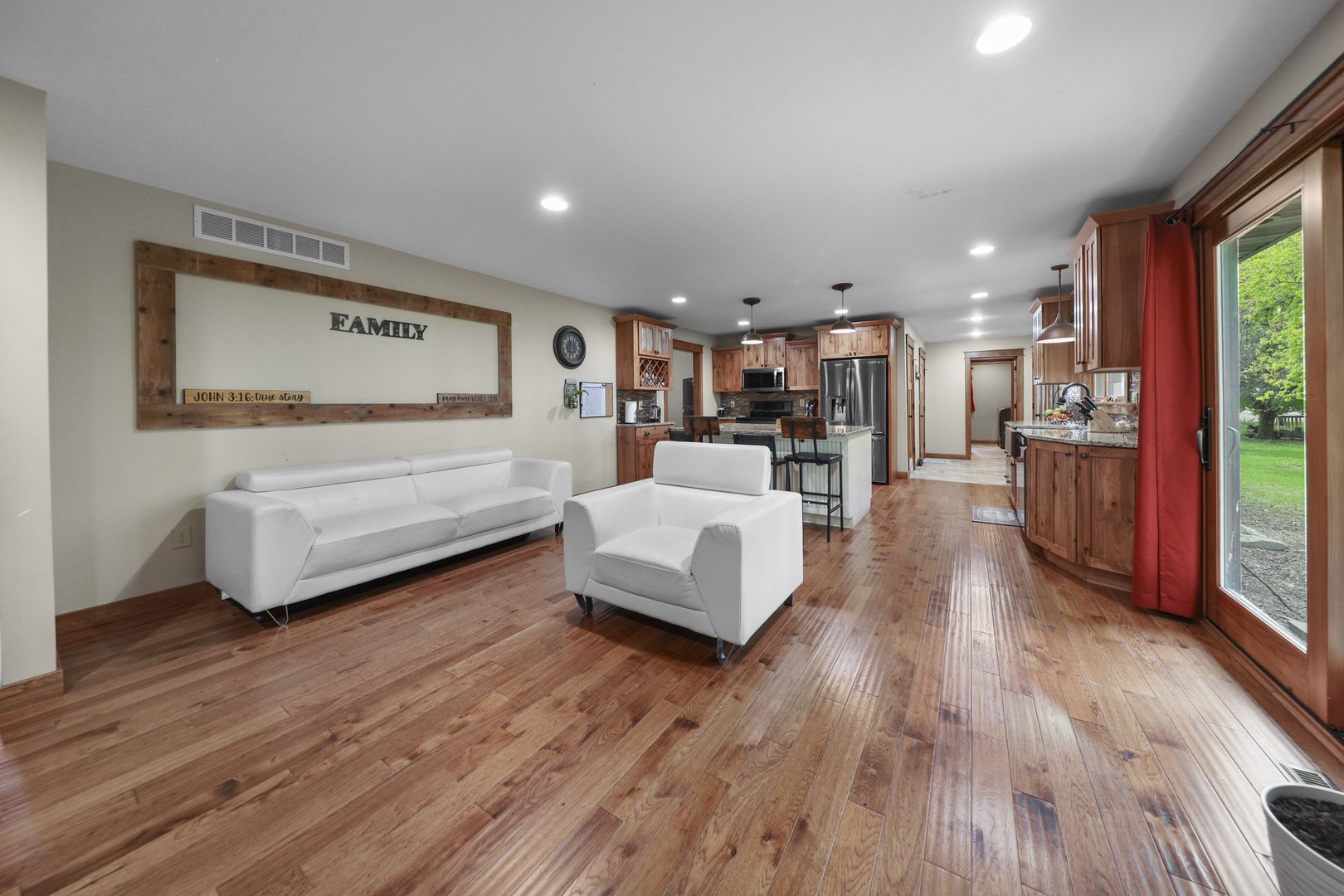 15547 Tower Road Lee, IL 60530 - Photo 5 of 24 a living room with furniture and a wooden floor