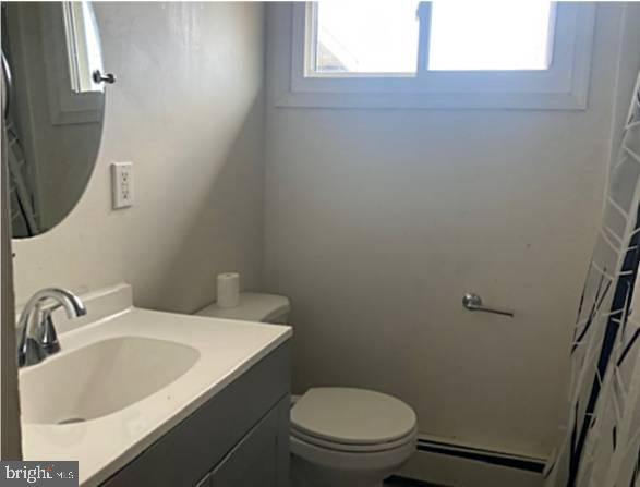 1902 Spencer Drive Croydon, PA 19021 - Photo 23 of 61 a bathroom with a sink a toilet and mirror