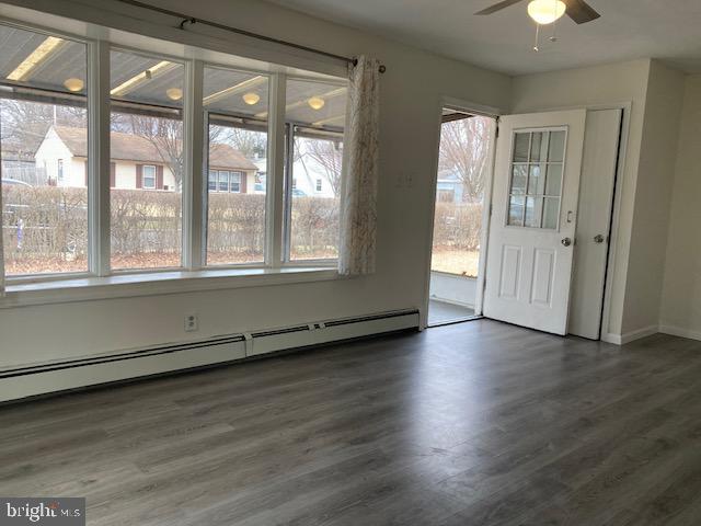 1902 Spencer Drive Croydon, PA 19021 - Photo 46 of 61 an empty room with wooden floor and windows