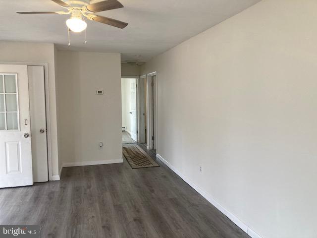 1902 Spencer Drive Croydon, PA 19021 - Photo 49 of 61 a view of an empty room with wooden floor and a ceiling fan