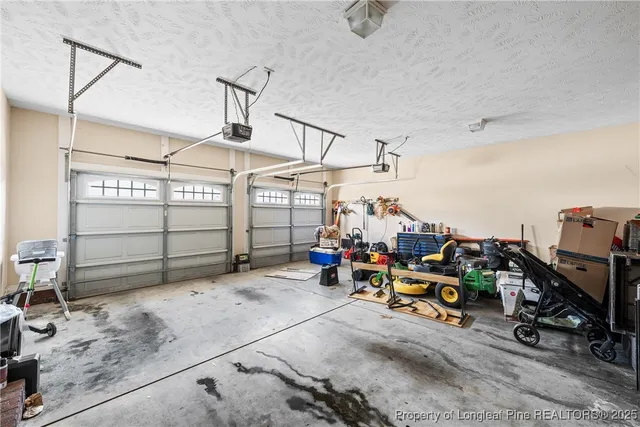 a view of a garage with rack and bicycle