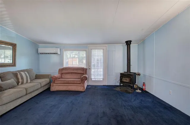 a living room with furniture and a couch