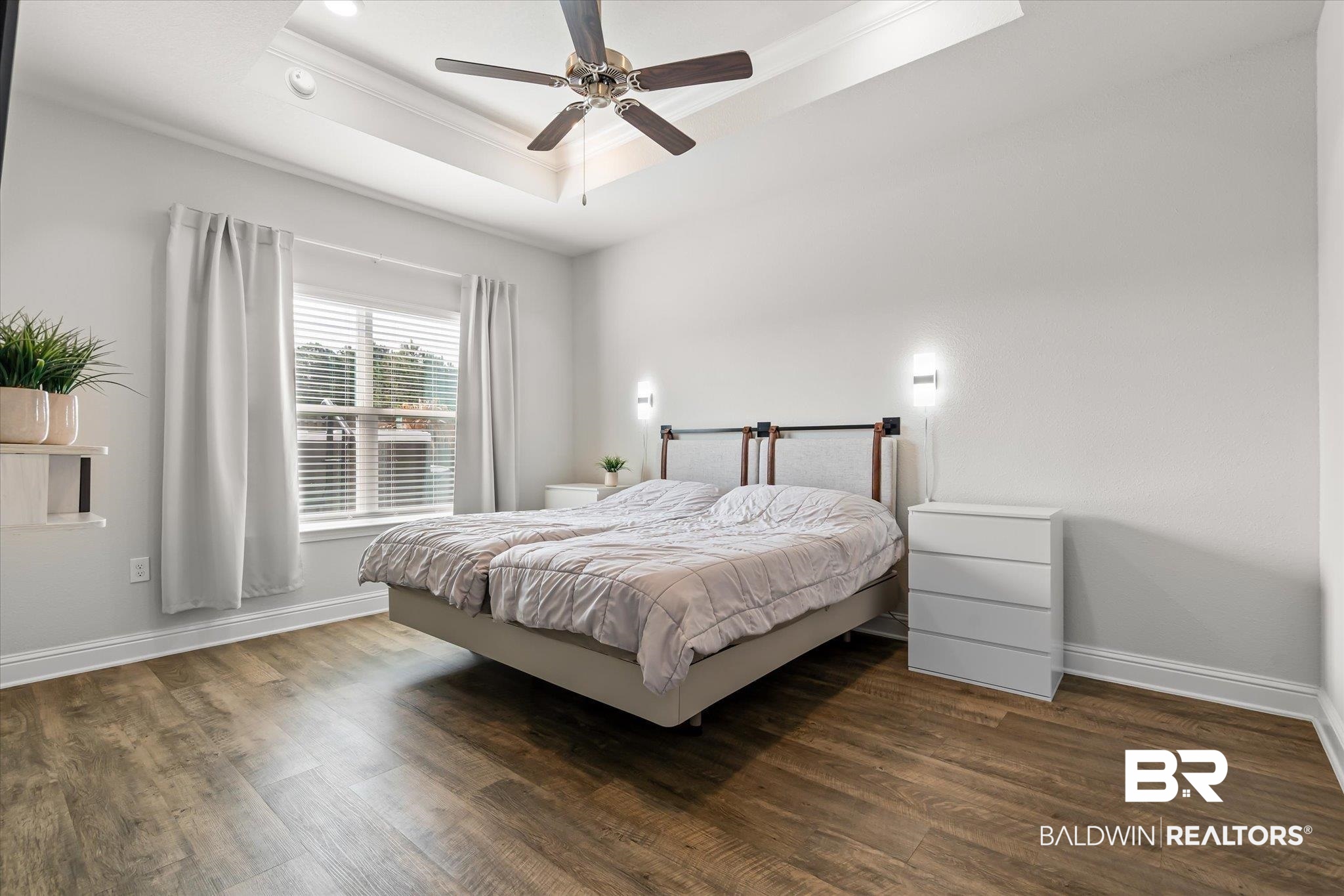 23246 Lieutenant Avenue Foley, AL 36535 - Photo 16 of 36 Bedroom featuring crown molding, a tray ceiling, dark wood-type flooring, and ceiling fan