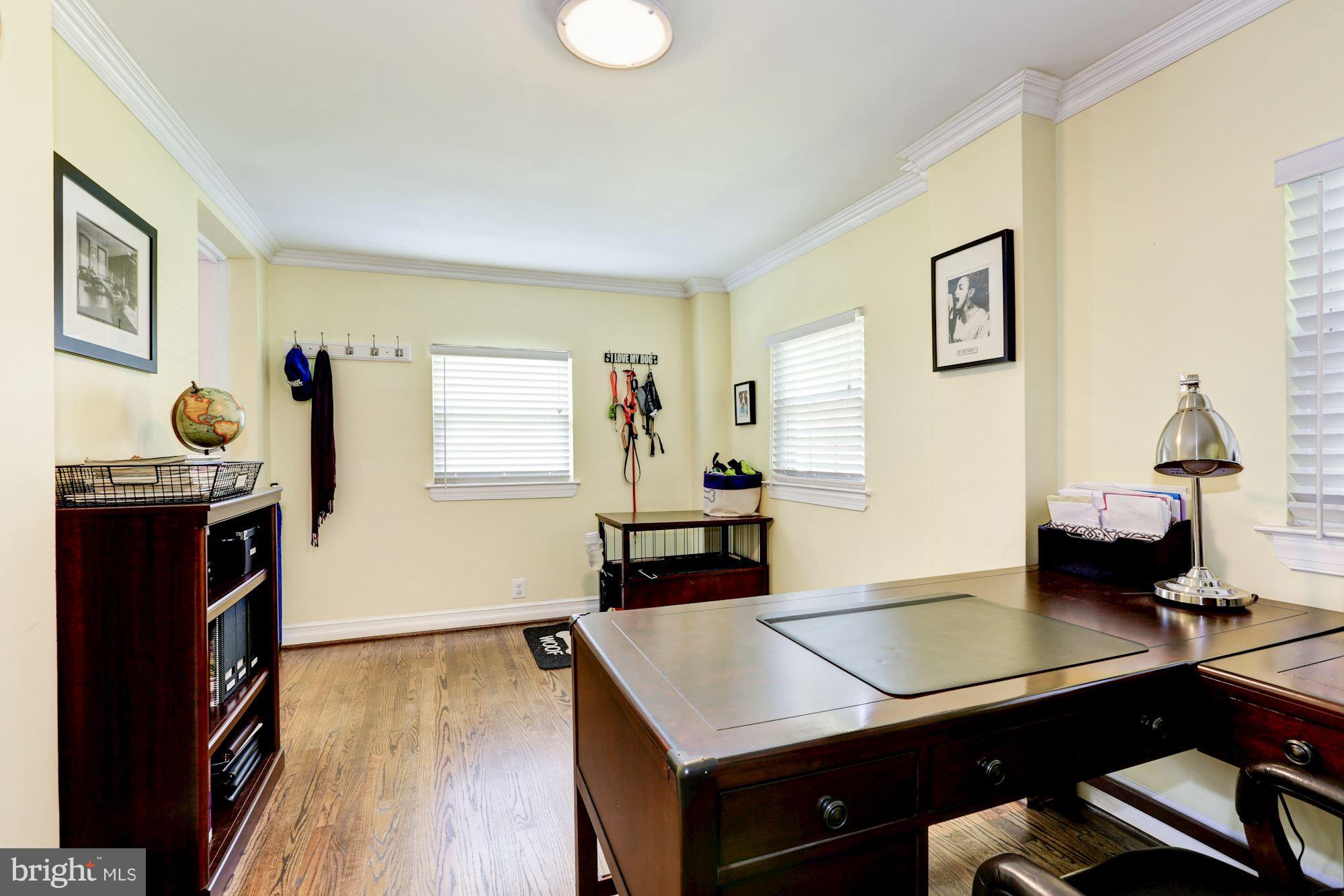 10016 Sidney Road Silver Spring, MD 20901 - Photo 14 of 25 a room with furniture and a wooden floor