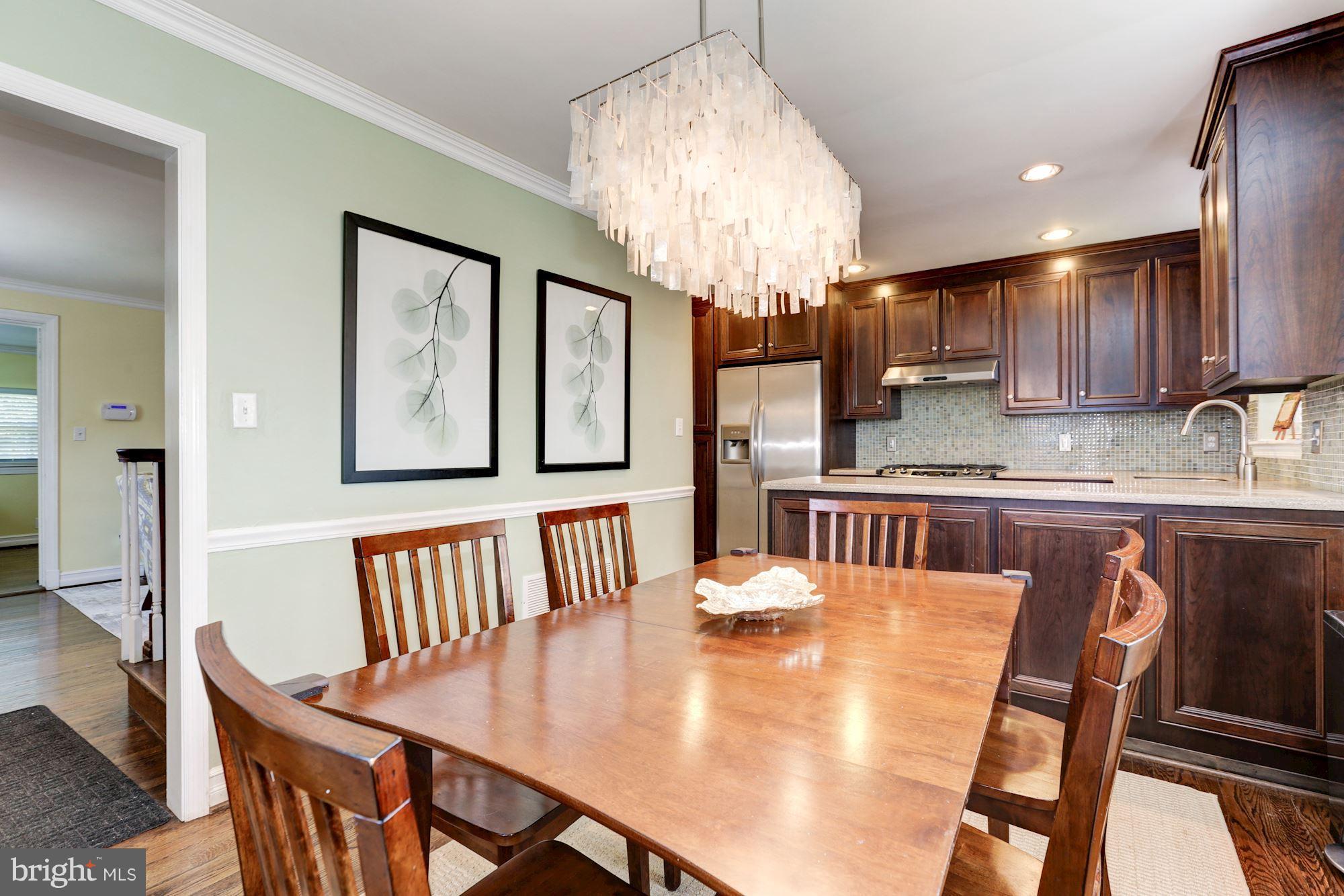 10016 Sidney Road Silver Spring, MD 20901 - Photo 6 of 25 a view of a dining room with furniture