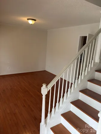 a view of entryway with wooden floor