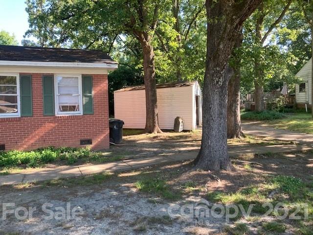 302 Lydia Street Monroe, NC 28110 - Photo 2 of 14 a view of a yard with a tree