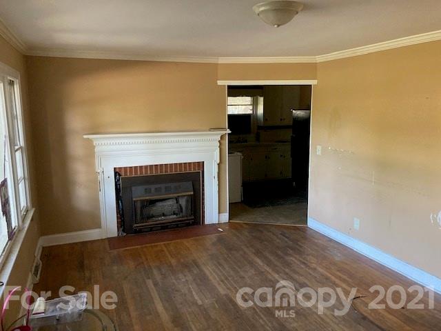 302 Lydia Street Monroe, NC 28110 - Photo 5 of 14 a view of a livingroom with a fireplace