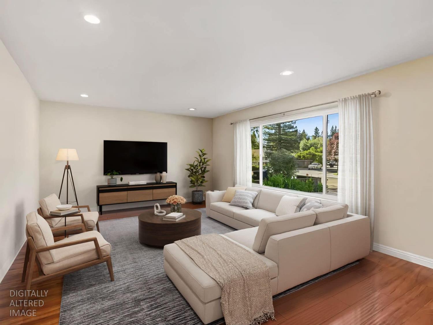 1540 Gregory Way Carmichael, CA 95608 - Photo 4 of 76 a living room with furniture and a flat screen tv