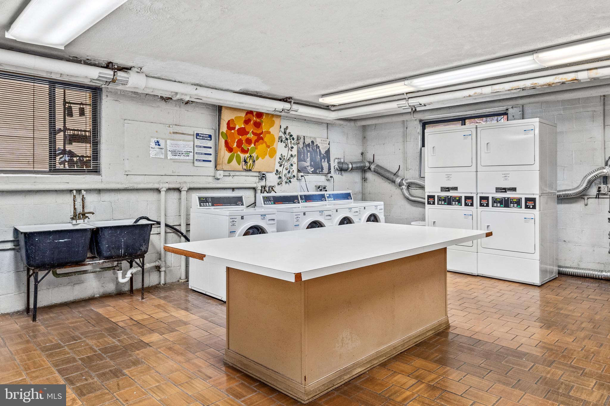 305 C Street Northeast, Unit 410 Washington, DC 20002 - Photo 15 of 15 a view of living room with stainless steel appliances kitchen island furniture and a fireplace