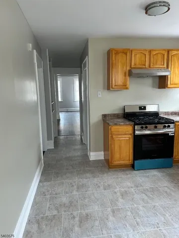 a bathroom with a shower and a toilet