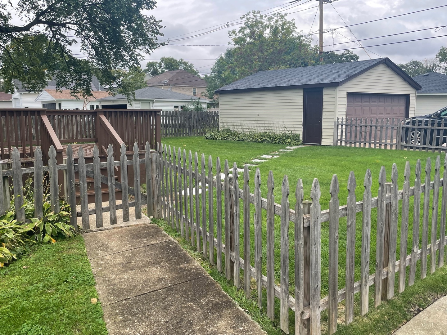 977 Spring Road Elmhurst, IL 60126 - Photo 10 of 13 a view of a house with iron fence