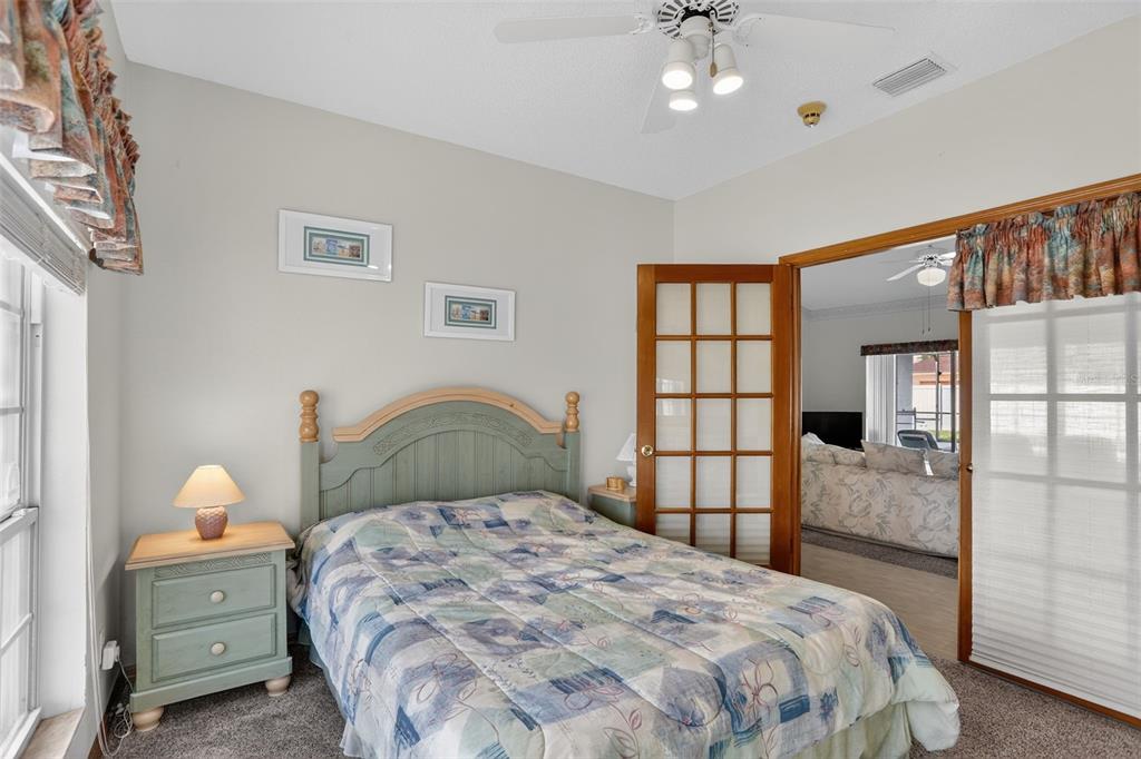 4995 Brook Road Kissimmee, FL 34758 - Photo 25 of 46 a bedroom with a bed and window