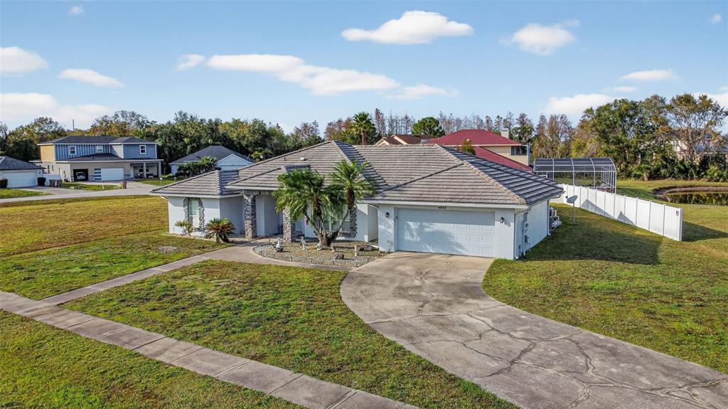 4995 Brook Road Kissimmee, FL 34758 - Photo 36 of 46 a front view of a house with garden