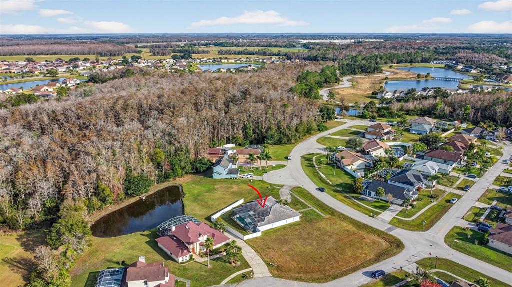 4995 Brook Road Kissimmee, FL 34758 - Photo 42 of 46 an aerial view of residential houses with outdoor space