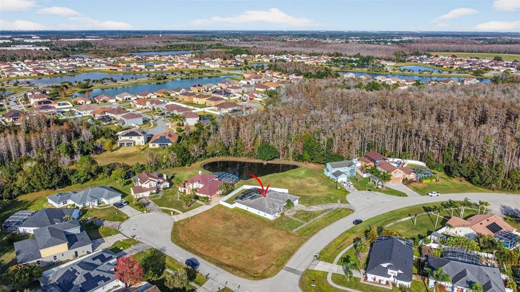 4995 Brook Road Kissimmee, FL 34758 - Photo 44 of 46 an aerial view of residential houses with outdoor space