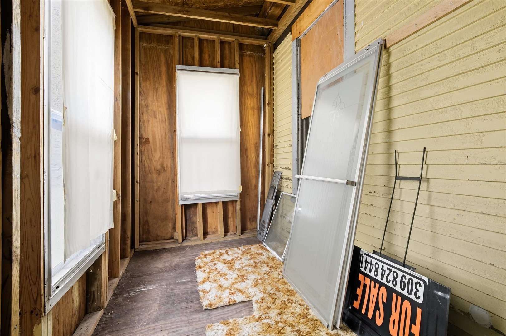603 West Oakland Avenue Bloomington, IL 61701 - Photo 21 of 33 a view of walk in closet with wooden floor and a bathroom