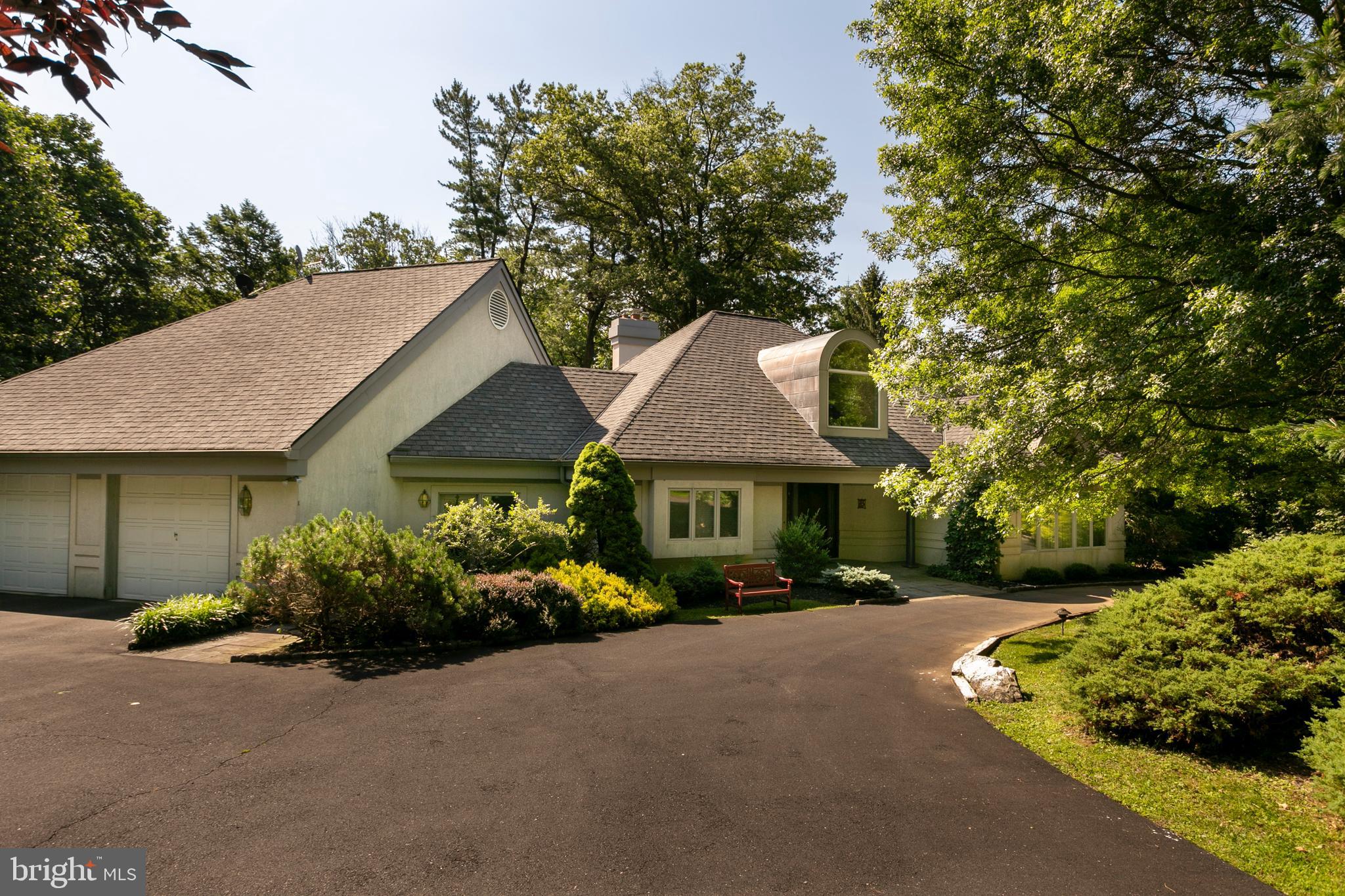 1637 Paper Mill Road Jenkintown, PA 19046 - Photo 1 of 1 a view of a house with a garden