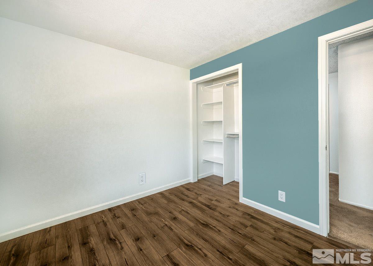 960 Cherry Tree Drive, Unit 2 Sparks, NV 89434 - Photo 17 of 19 a view of a room with wooden floor