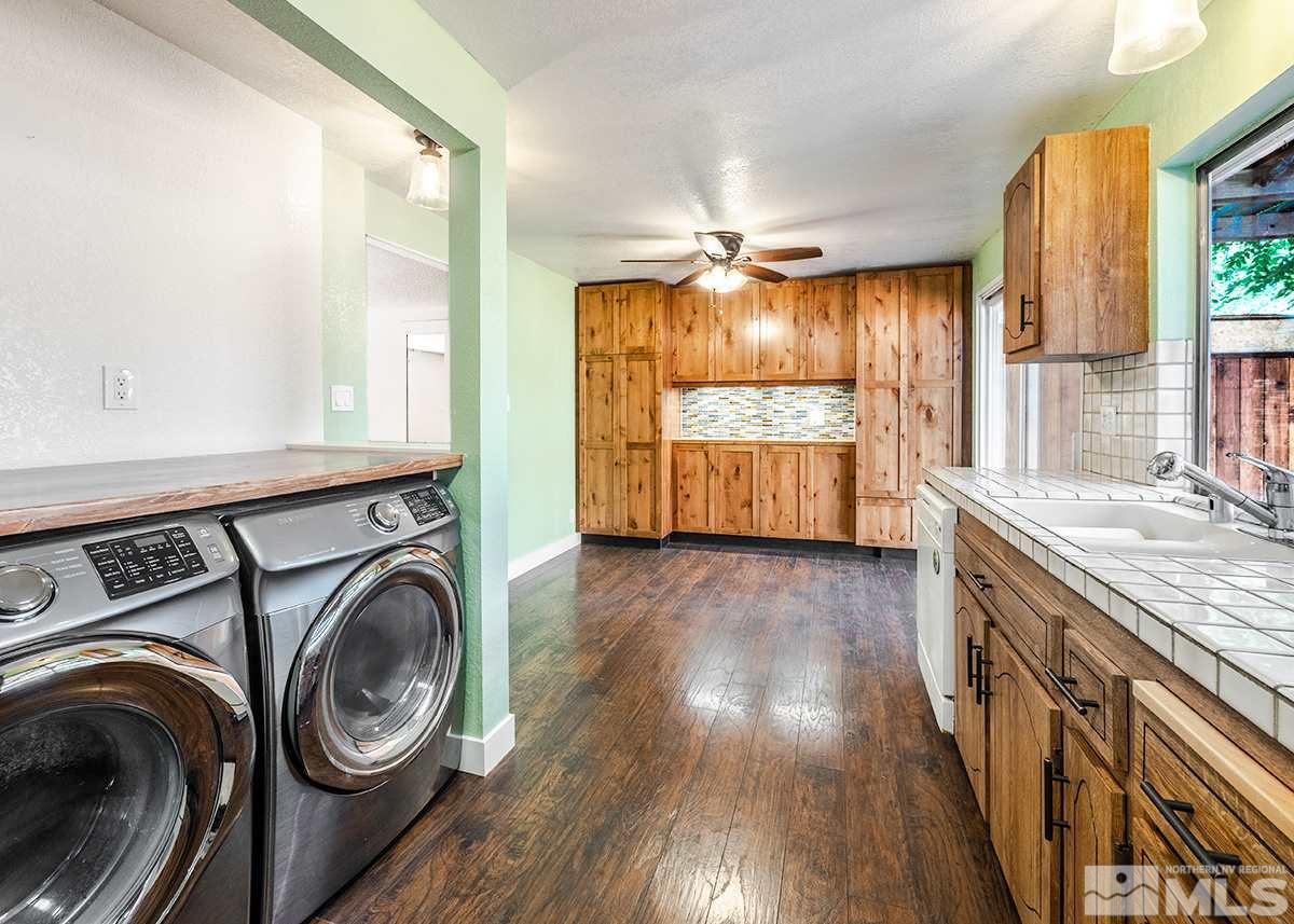 960 Cherry Tree Drive, Unit 2 Sparks, NV 89434 - Photo 9 of 19 a view of a kitchen with washer and dryer