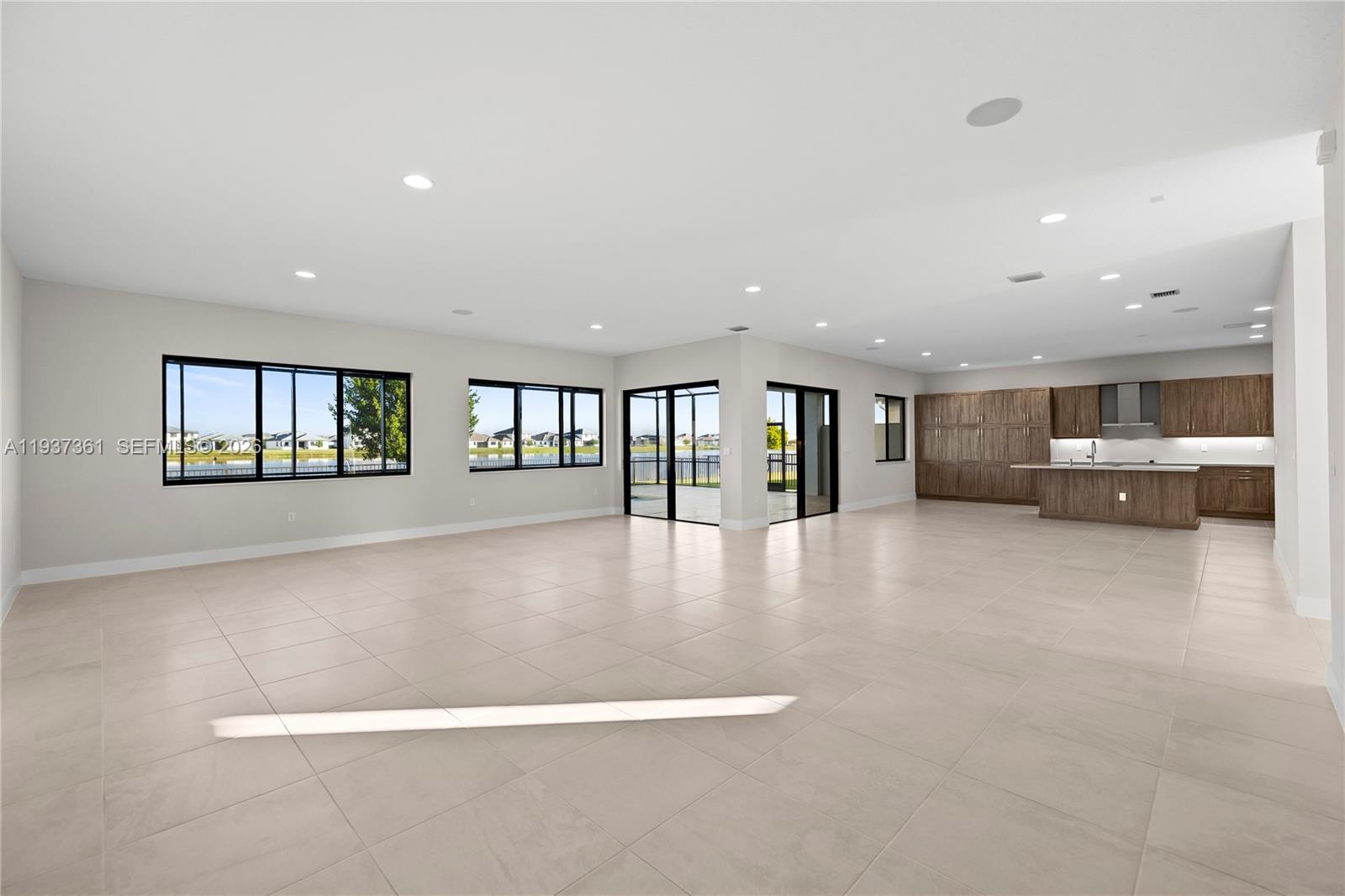 5197 Julienne Road Ave Maria, FL 34142 - Photo 14 of 43 Main living area with recessed lighting and open layout