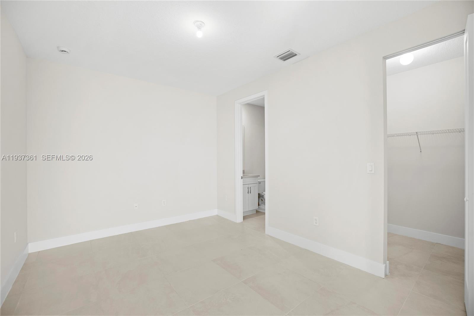 5197 Julienne Road Ave Maria, FL 34142 - Photo 16 of 43 First-floor en-suite bedroom with private exterior entrance