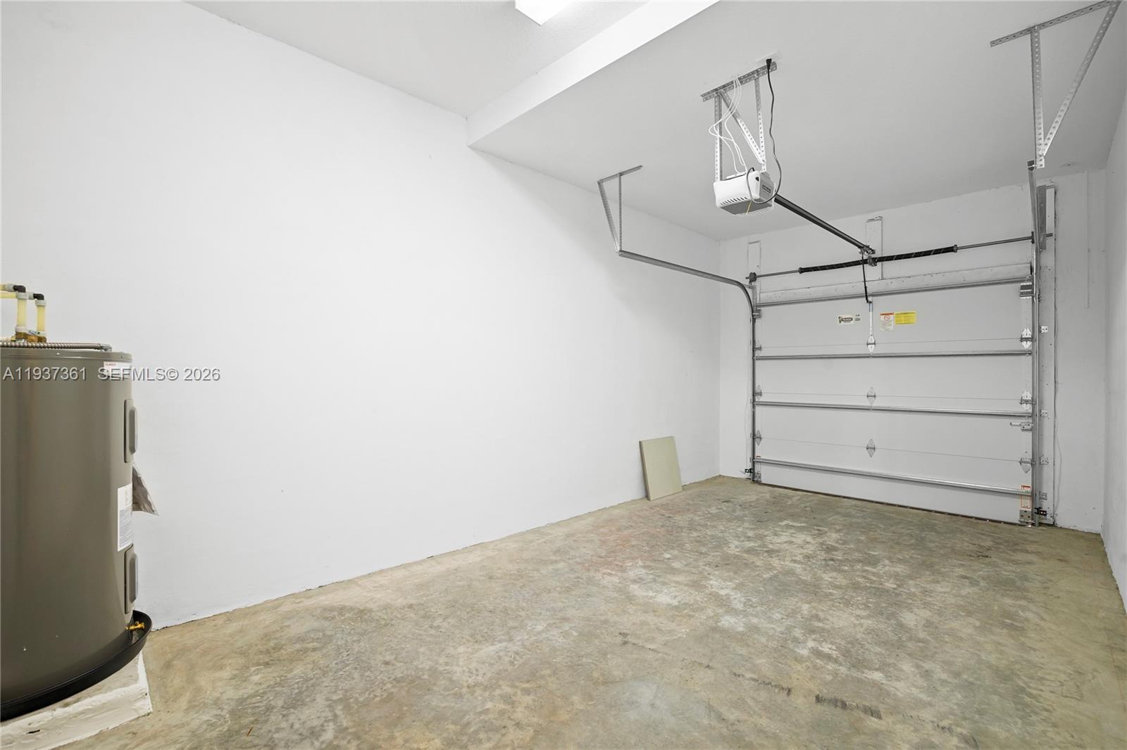 5197 Julienne Road Ave Maria, FL 34142 - Photo 43 of 44 a view of a room with storage and utility