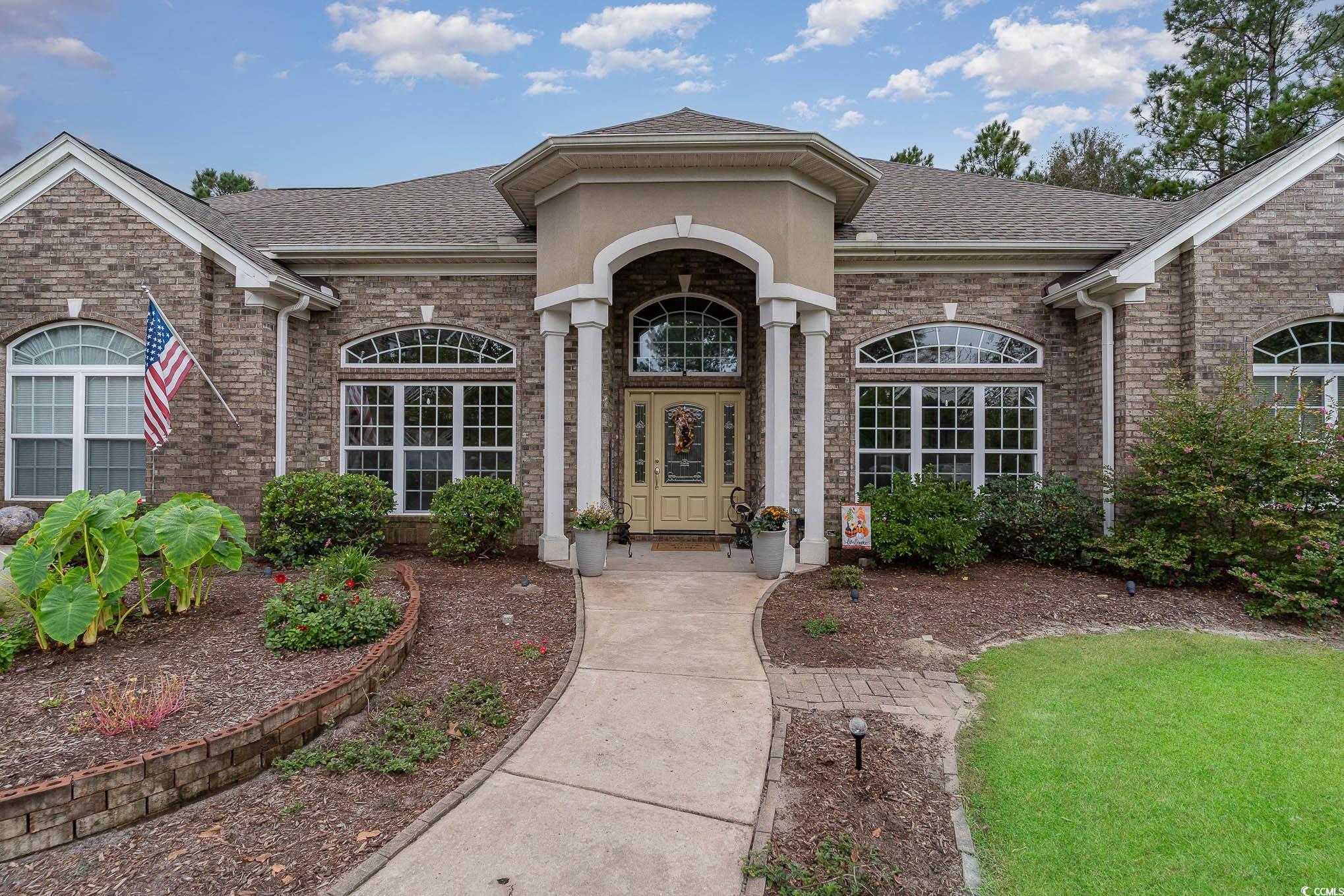 986 Day Star Way Loris, SC 29569 - Photo 3 of 40 Property entrance featuring a yard