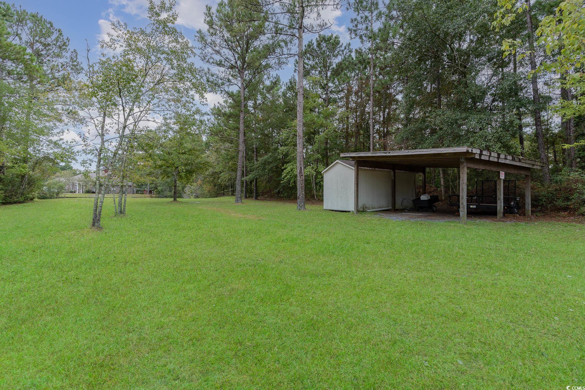 986 Day Star Way Loris, SC 29569 - Photo 38 of 40 View of yard featuring an outdoor structure and a