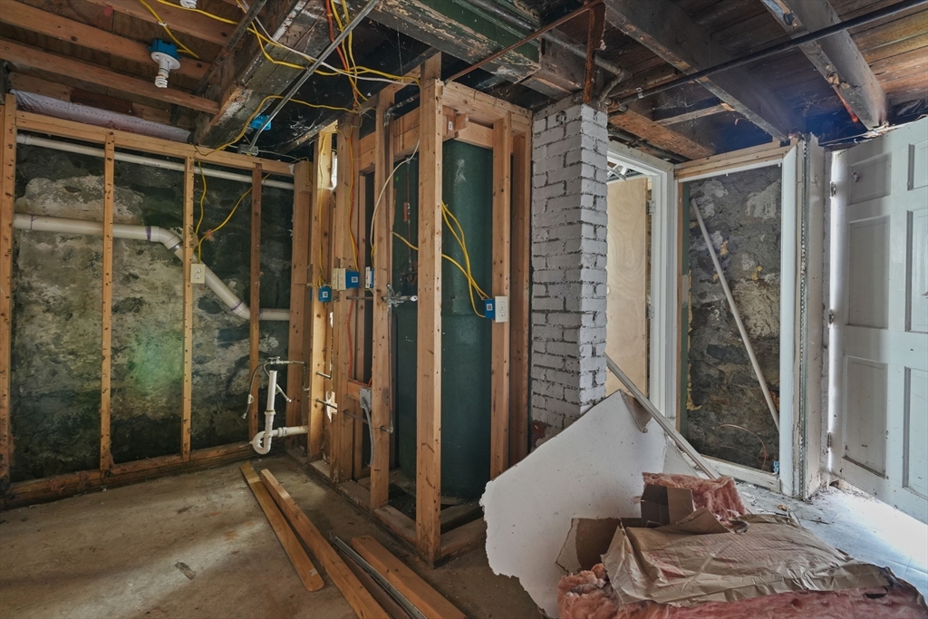 213 Weetamoe Street Fall River, MA 02720 - Photo 12 of 34 a view of an entryway with wooden floor