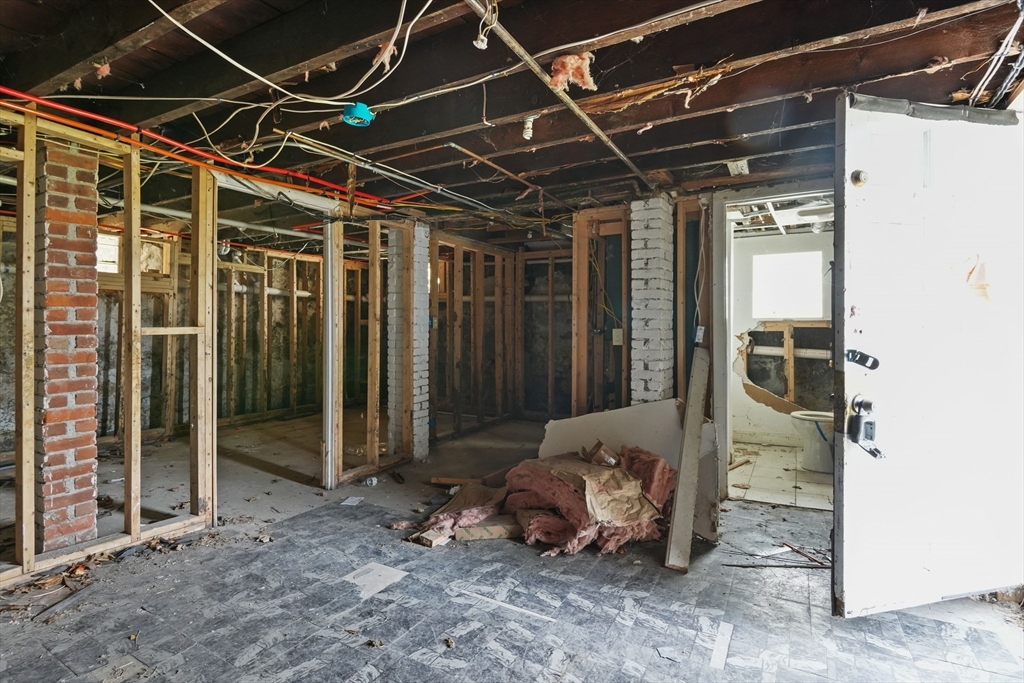 213 Weetamoe Street Fall River, MA 02720 - Photo 16 of 34 a view of a room with wooden walls
