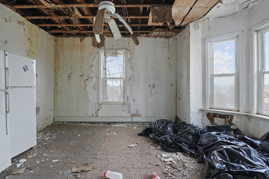 213 Weetamoe Street Fall River, MA 02720 - Photo 17 of 34 a room with lots of trees