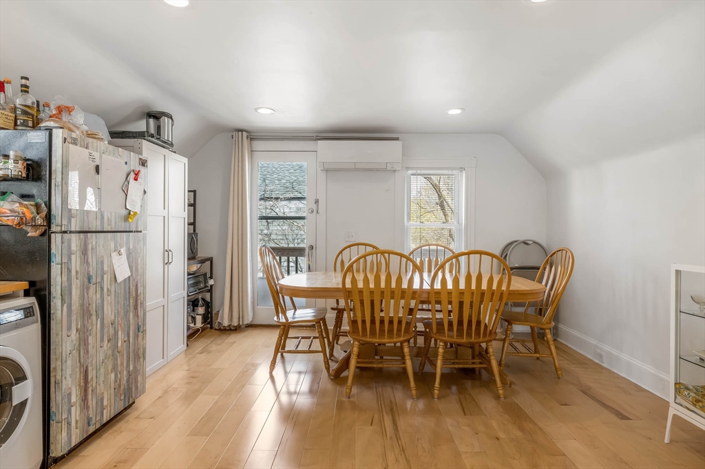 151 Magazine Street, Unit 3 Cambridge, MA 02139 - Photo 6 of 26 a view of a dining room with furniture window and wooden floor